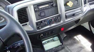 The cab of a Hino truck with the door open