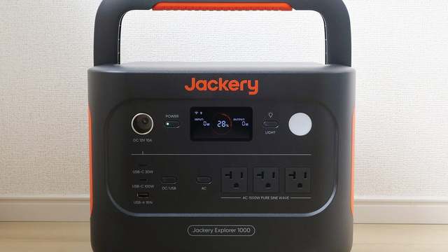 A Jackery Explorer 1000 portable power station with a carry handle