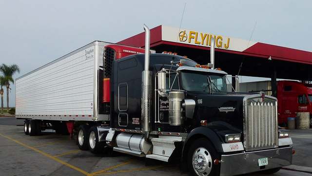 A Kenworth at a travel plaza