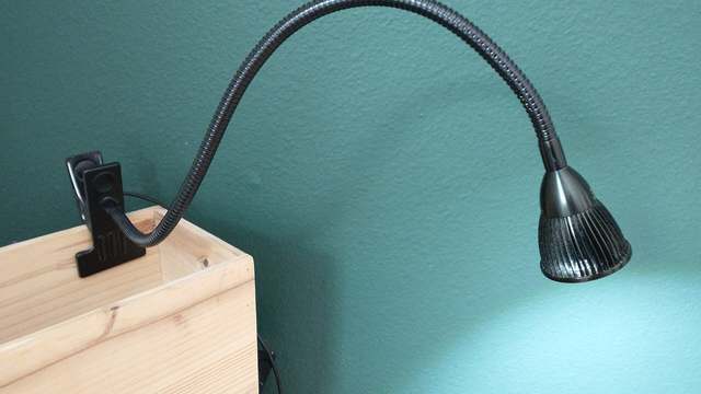 An LED gooseneck lamp aimed like a bunk reading light
